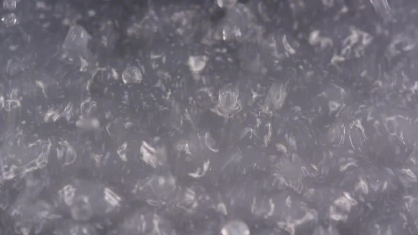 Water boils rapidly releasing steam into the air