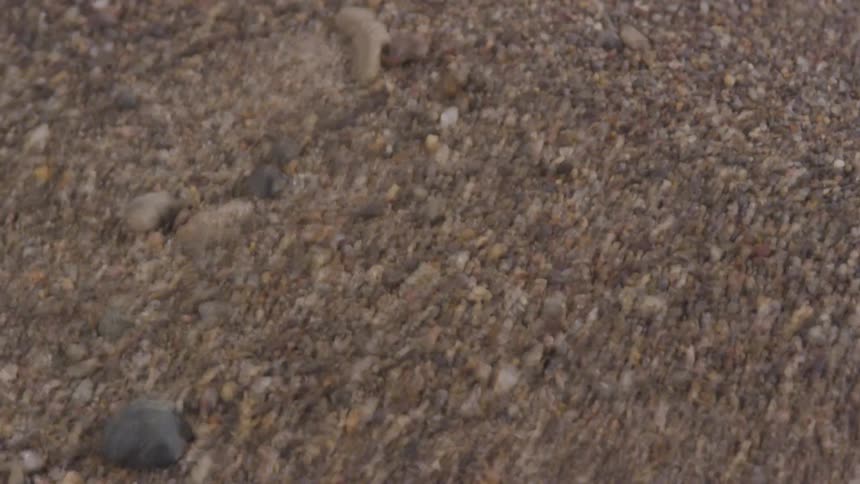 Wind blowing rocks and stones outdoors
