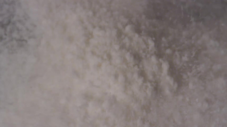 White foam flowing and spraying upwards