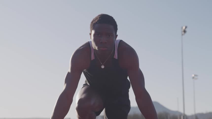 Track athlete in starting position