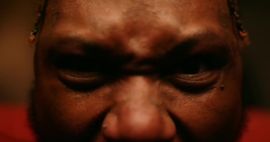 Close view of man making enraged expression