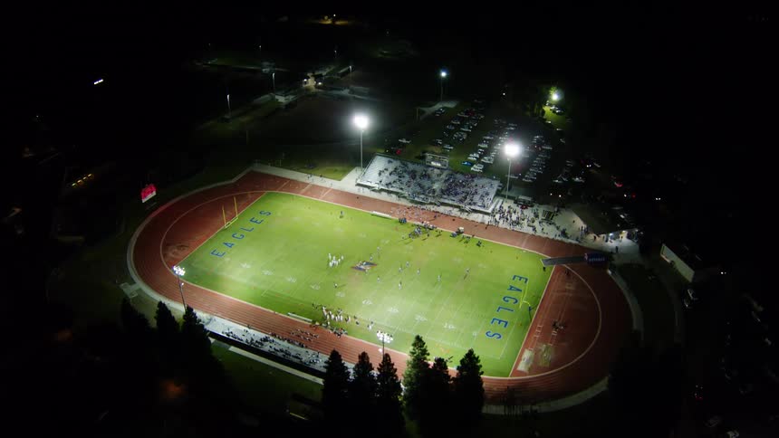 Aerial view of football stadium at night