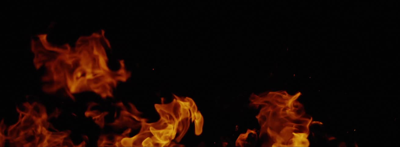 Campfire burning at night