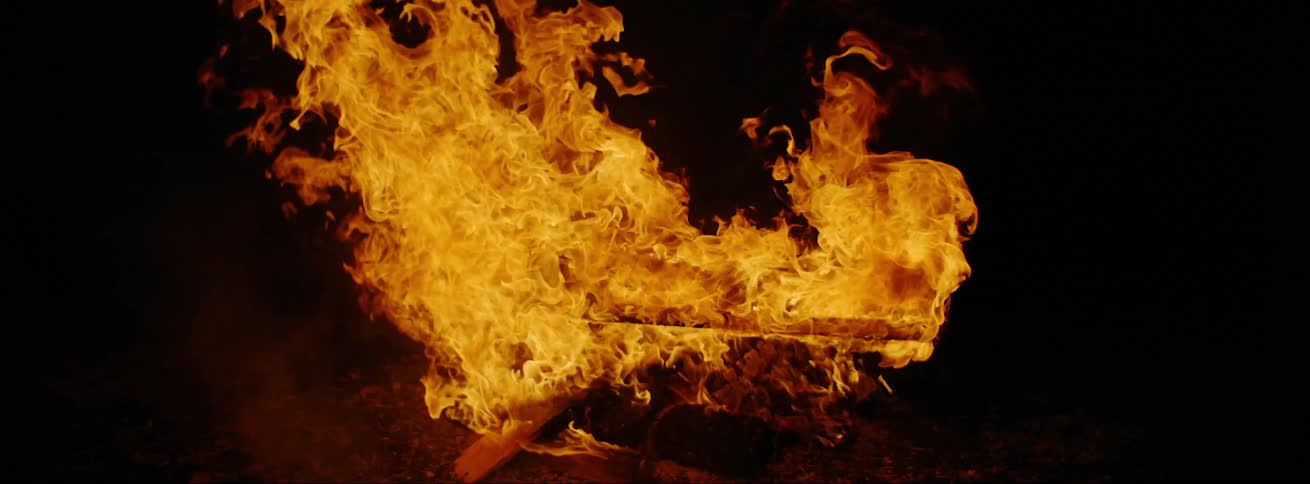 Campfire burning at night