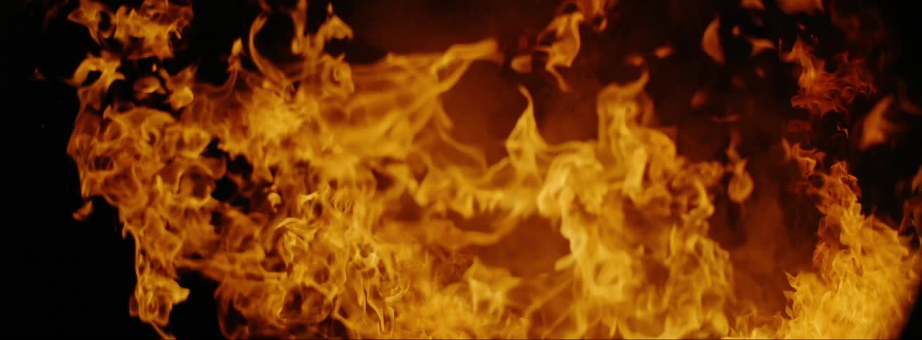 A fire is burning at night