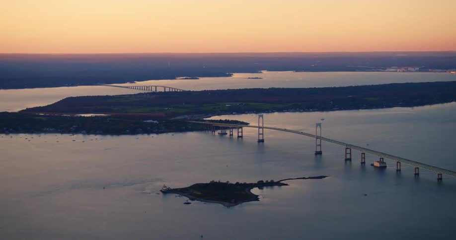 Bridges over a river connecting an island to mainland at sunset