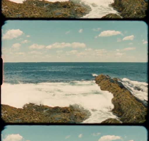 Waves roll in to the rocky shoreline