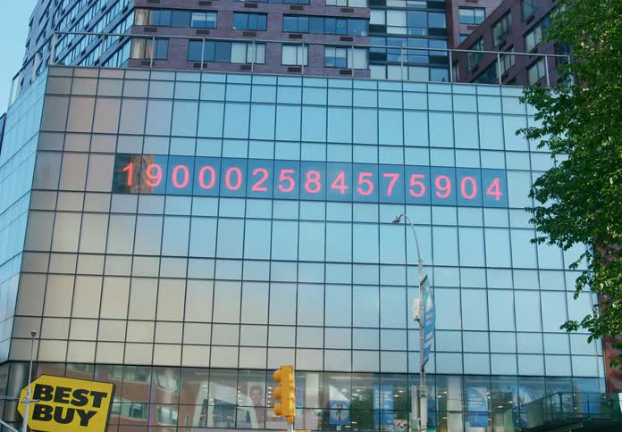 Large counter displayed on side of storefront with best buy displayed counts upwards