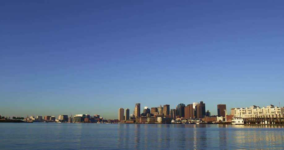 A downtown city is surrounded by an ocean