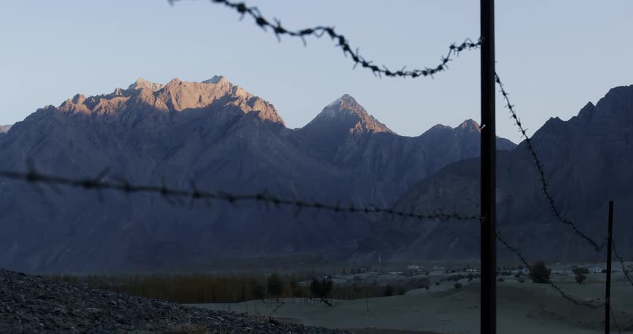 A mountain is displayed in a rural area