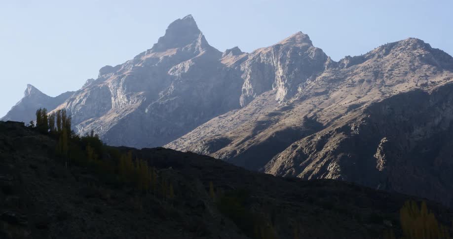 An aerial view of a mountain is displayed