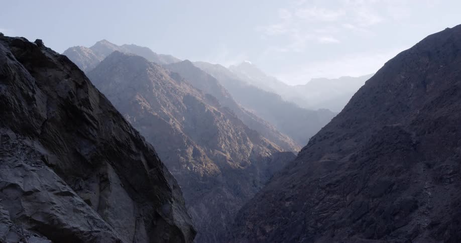 An aerial view of mountains is displayed