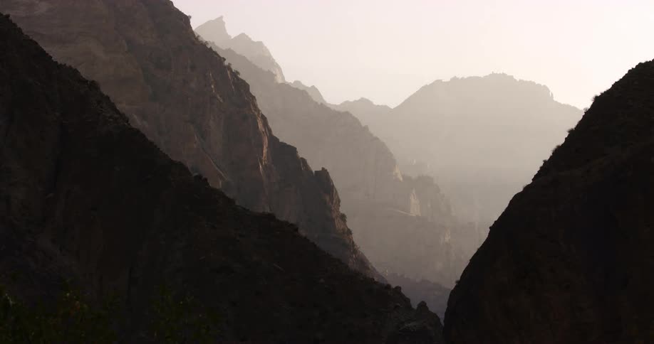 An aerial view of a mountain landscape is displayed