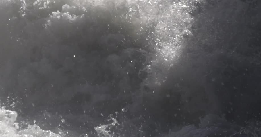 A strong wave sends ocean water rising