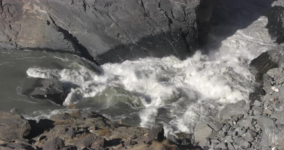 Turbulent waters in the rapids section of a river