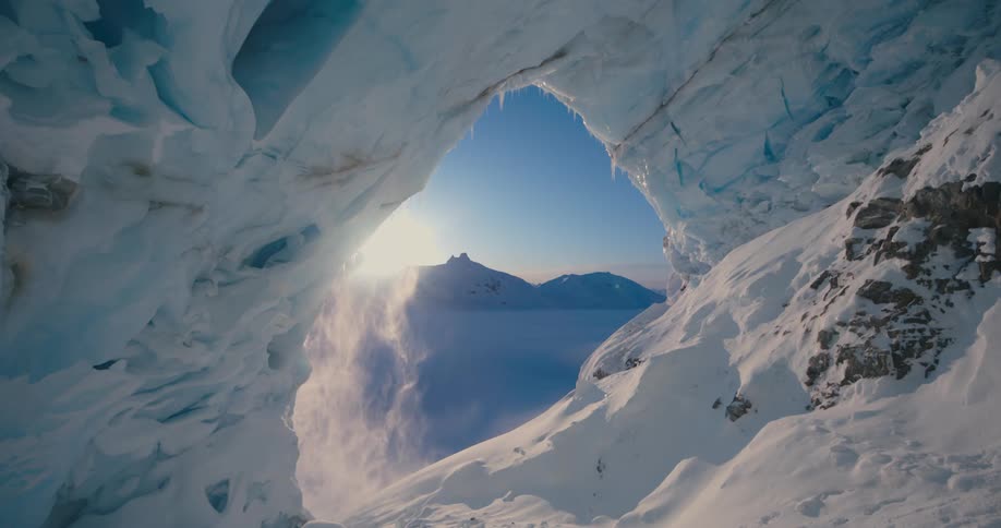The sun is setting in an arctic area