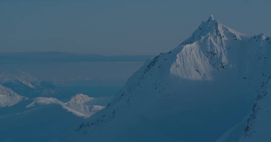 View of high snow capped mountains