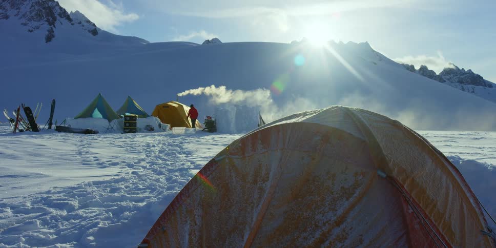 Tents in snowy mountain campsite