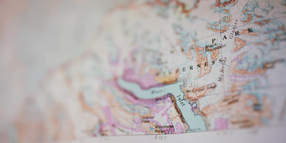 A map on the wall with text lines and colors