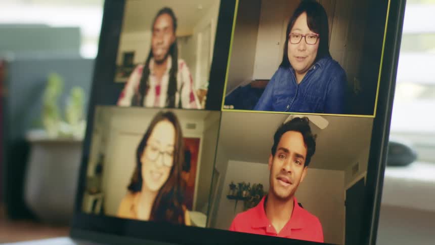 Group of coworkers on zoom meeting on laptop screen