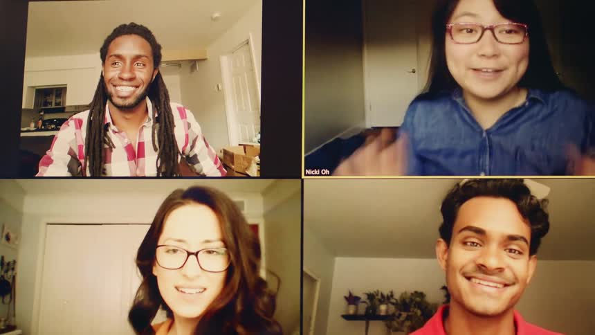 The faces of four people on a computer screen as they video chat