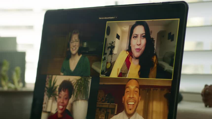 Group of people talking to each other in a video call in a laptop at home