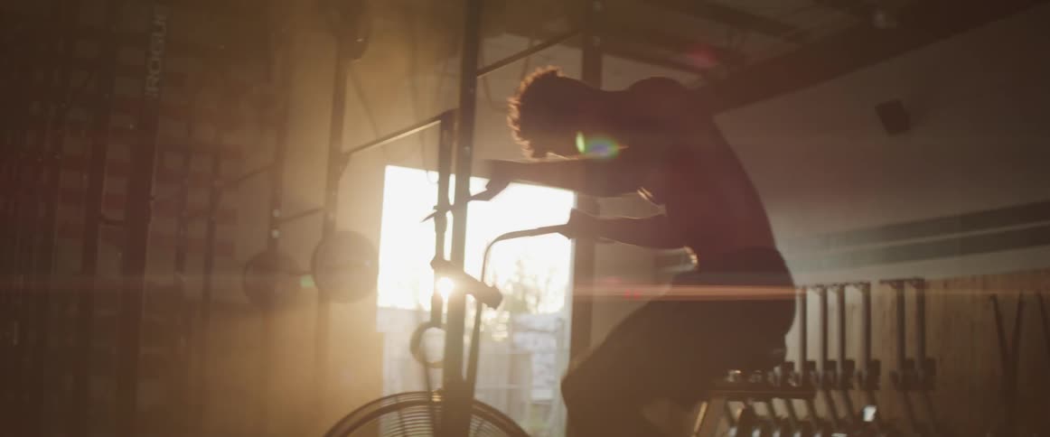 A man is working out in a gym