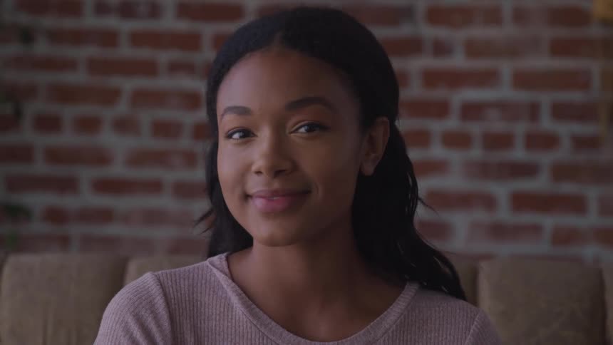 Black teenage girl smiling