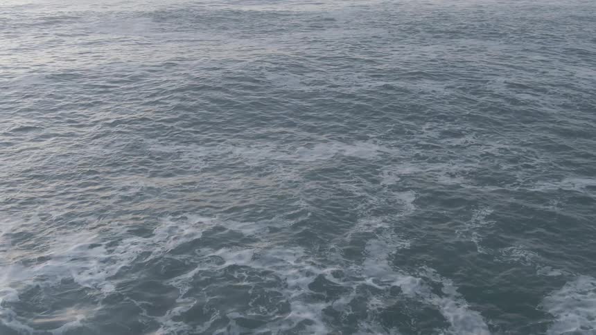 The ocean moves back and forth