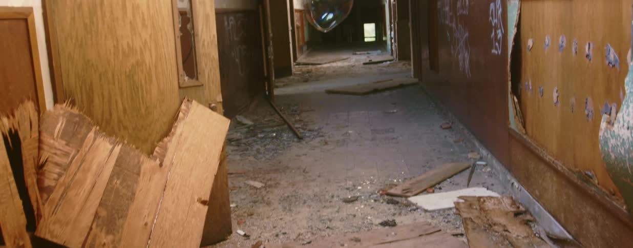A large bubble floats down the hall
