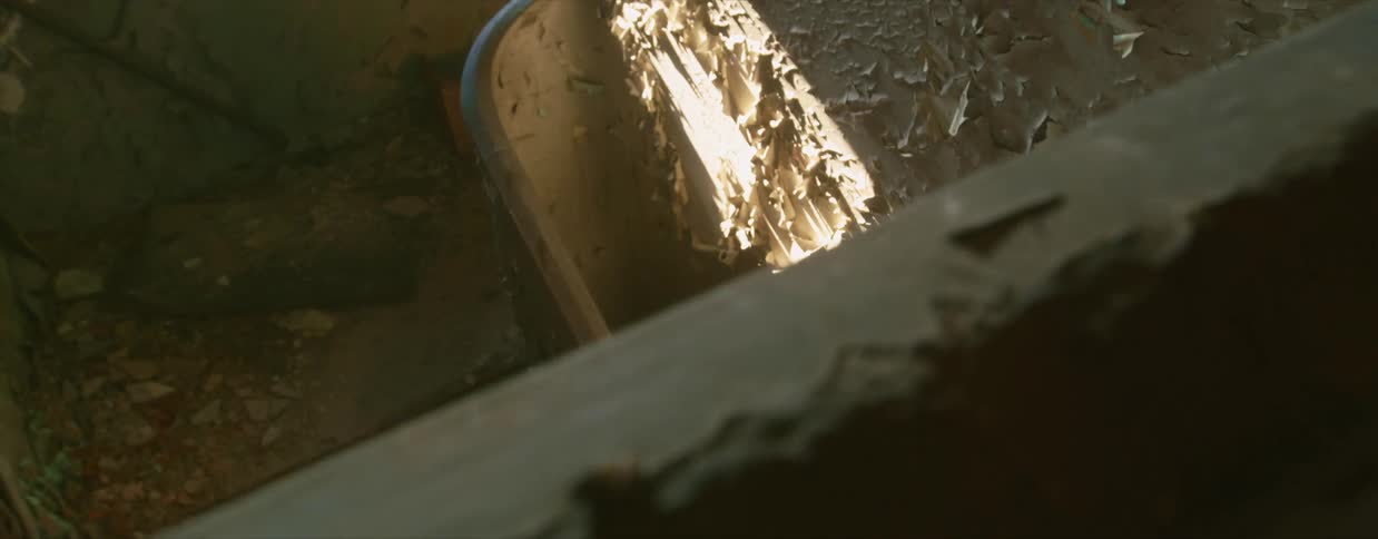 Looking over a worn out staircase in a building
