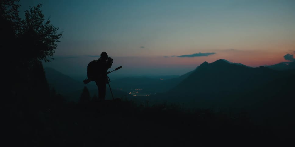 A man is hiking in the wilderness
