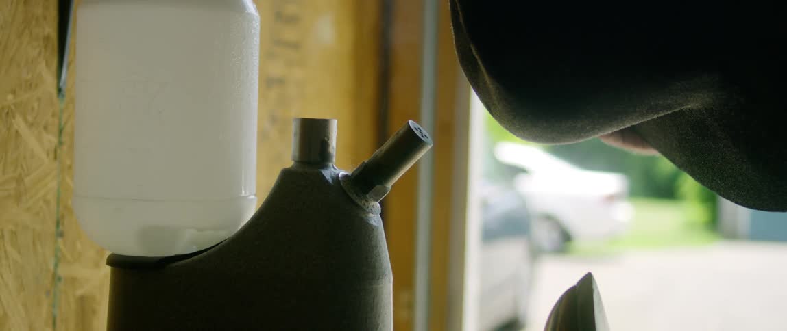 Milliner makes a hand made cowboy hat in a workshop