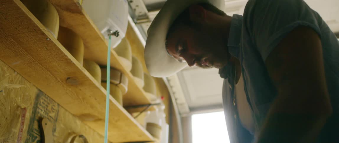 Milliner making hand made cowboy hats in a workshop