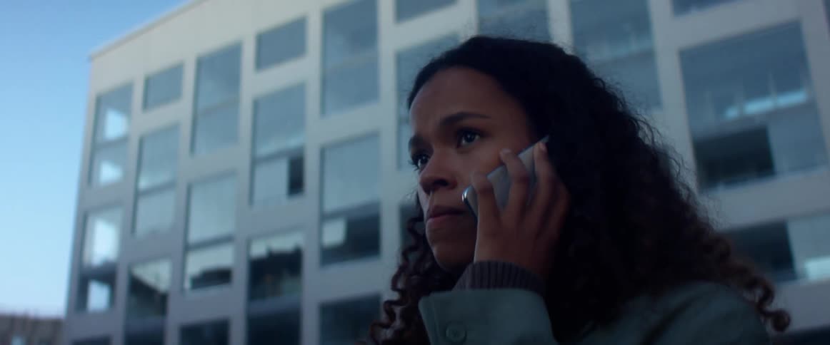 A woman is talking on her phone