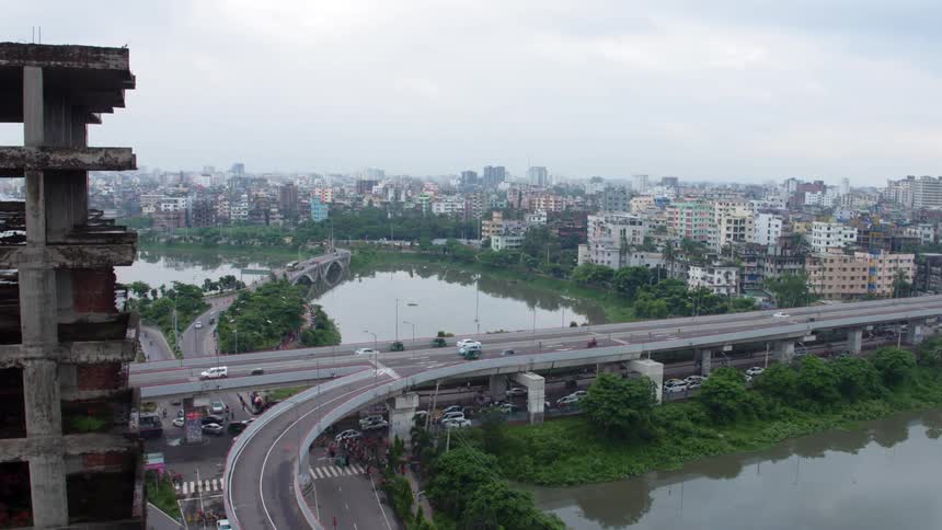 An aerial view of a downtown city is displayed
