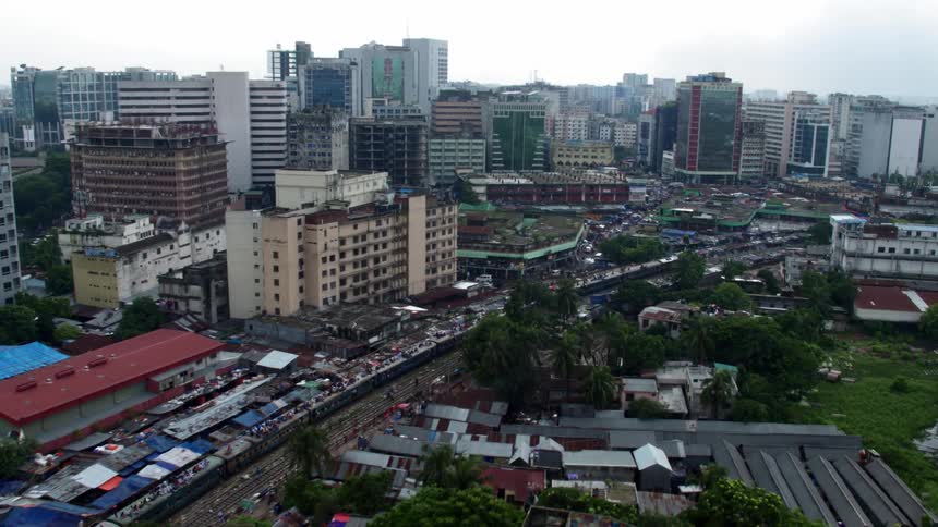 An aerial view of a downtown city is displayed