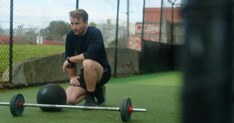 A man in a public park exercises