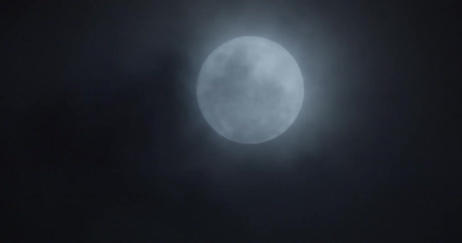A moon is displayed at night