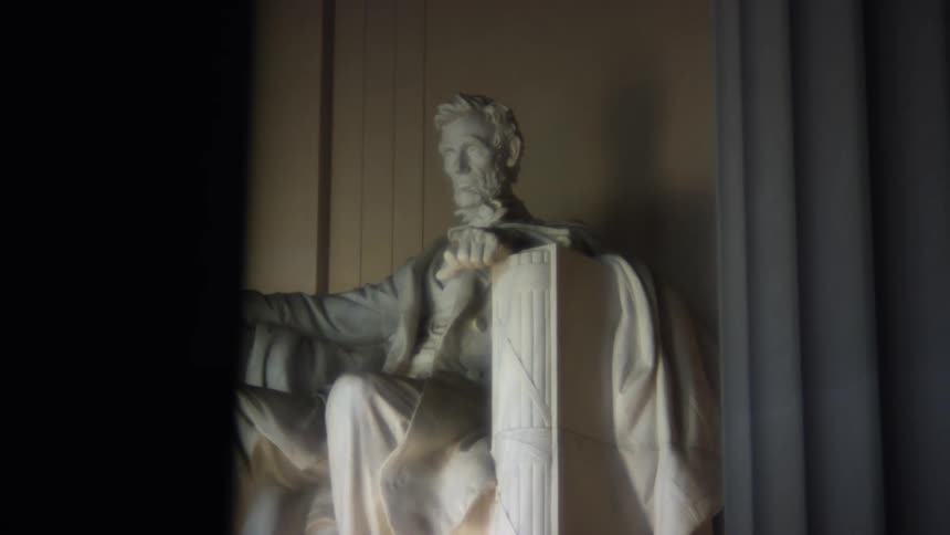 The sculpture of abraham lincoln at the lincoln memorial