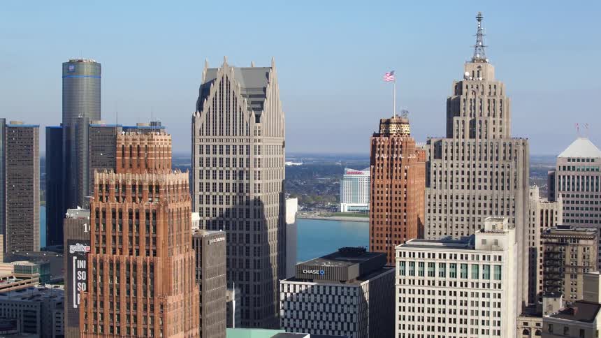 An aerial view of a downtown city is displayed