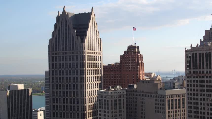 An aerial view of a downtown city is displayed