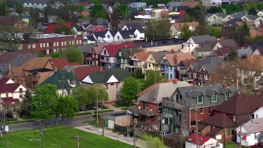 A dense city neighborhood during the day