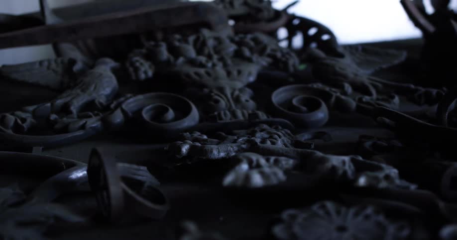 Wrought iron piece with scrolls and birds