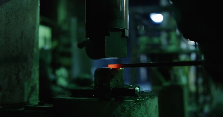 A machine welding a piece of metal