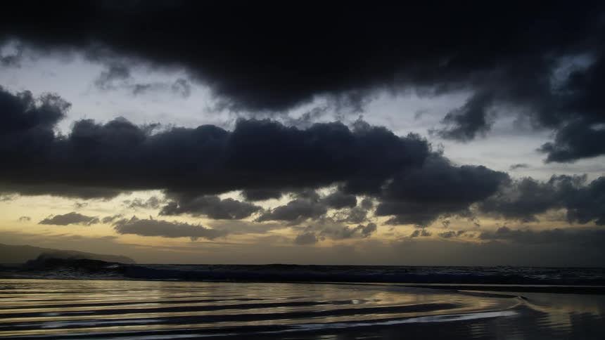 water ripple at the ocean at dusk