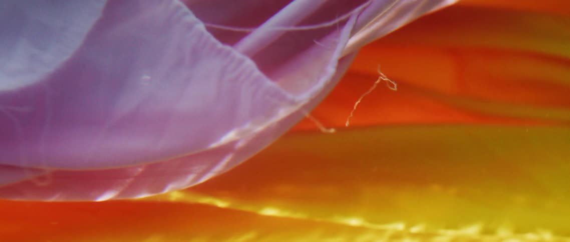 Colorful fabric flowing and billowing underwater