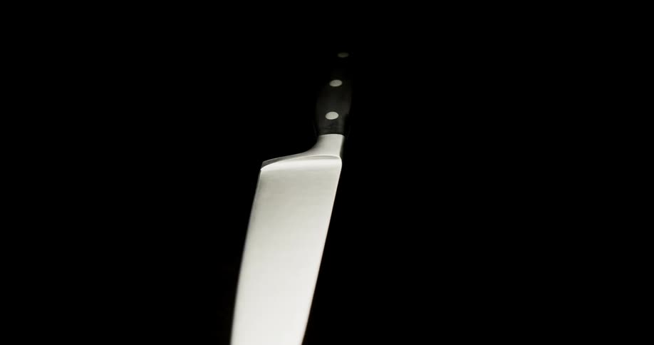 A kitchen knives spins in space