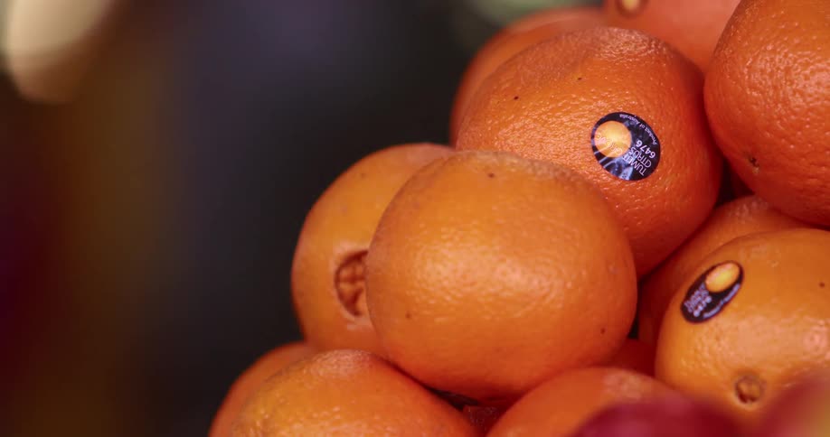 A pile of oranges in a market