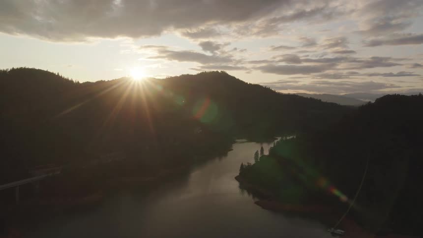 The sun is setting in the horizon